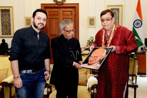 Vedant Sharmaa & Guruji Gobind Sharma With President Pranab Mukherjee At President House presenting him mahatma gandhi painting made by my grandfather of flowers & petals